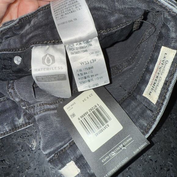 NEW LEVI’S HIGH RISE FLARE GREY BLACK STRETCH DENIM JEANS SZ 33x34 - Picture 13 of 14